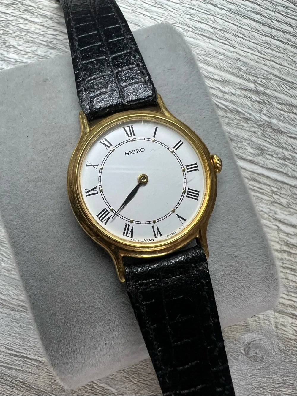 Seiko Gold-Tone Case White Roman numeral Dial Black Leather Strap Watch